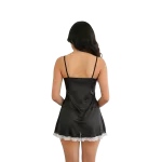 Vista posterior del disfraz de mucama sexy con babydoll de tul negro